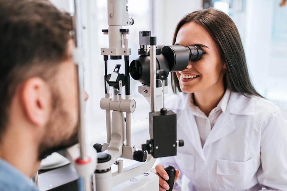 Eye doctor examining a patient